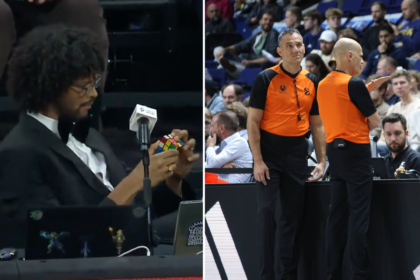 Rungtynių pranešėjas teisėjų pasitarimo metu sprendė Rubiko kubą (Scanpix/Stopkadras)