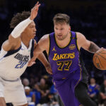 Luka Dončičius ir Kessleris Edwardsas (Scanpix nuotr.)