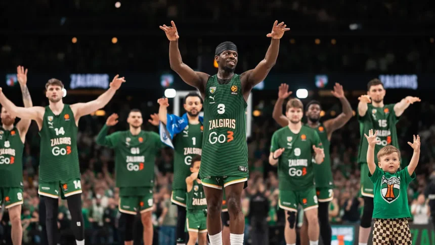 Zalgiris basketball players in green uniforms raise their arms in celebration on the court, with a child in a matching shirt on the right.