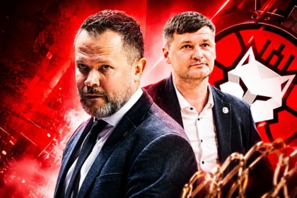 Two men in suits stand back-to-back against a bold red background with a circular emblem behind them.