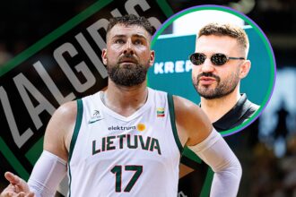Lithuanian basketball player in a white LIETUVA jersey with number 17, standing with a teammate, during a game with graphic green ring overlay.