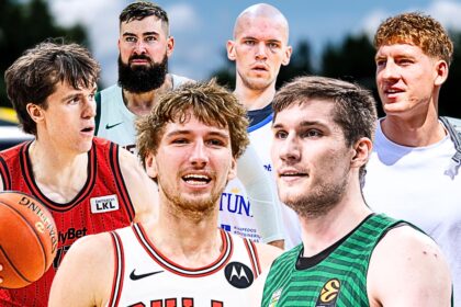 Six male basketball players pose together outdoors in colorful uniforms, one holding a basketball at the front.