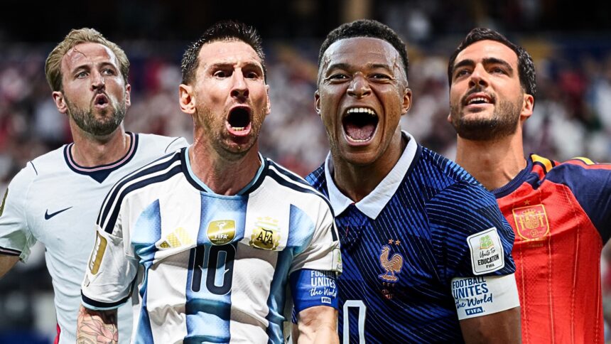 Four football players in national team jerseys cheer with mouths open, celebrating on the pitch with a stadium crowd behind them.